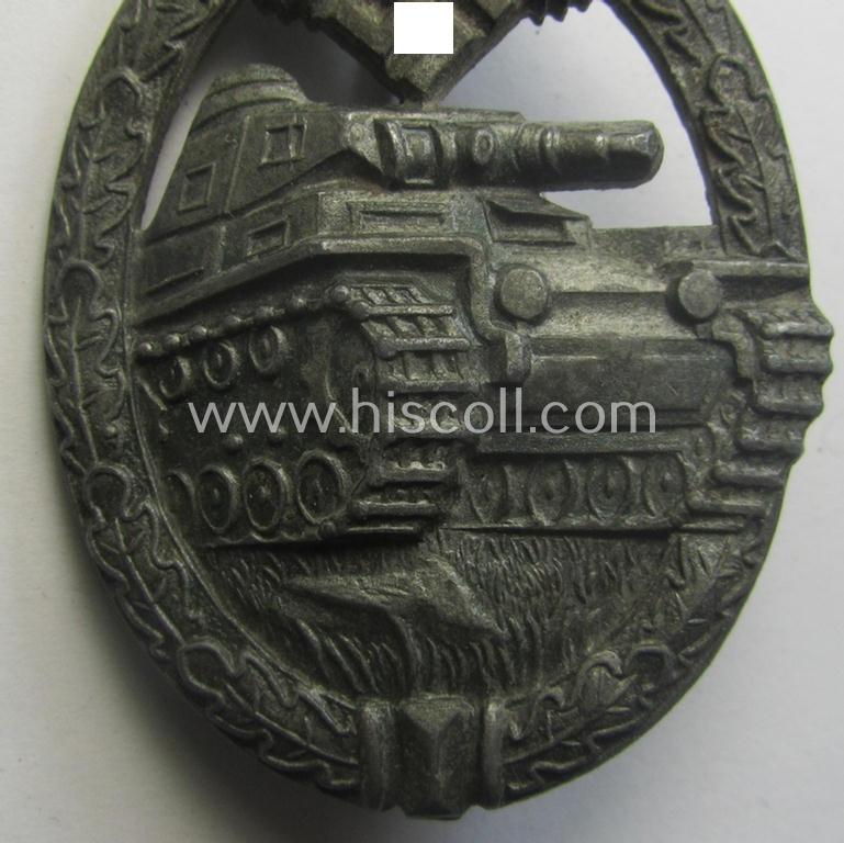 'Panzerkampfabzeichen in Bronze' being a clearly maker- (ie. 'KWM'-) marked (and/or: typical zinc- ie. 'Feinzink'-based-) example as was procuced by the: 'Karl Würster'-company