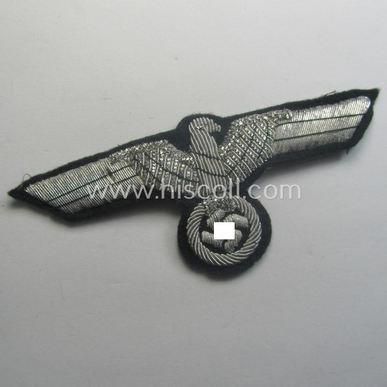 WH (Heeres) officers'-type, hand-embroidered breast-eagle (ie. 'Brustadler für Offiziere') as was executed in bright-silverish-coloured braid as was intended for usage on the various officers'-pattern tunics