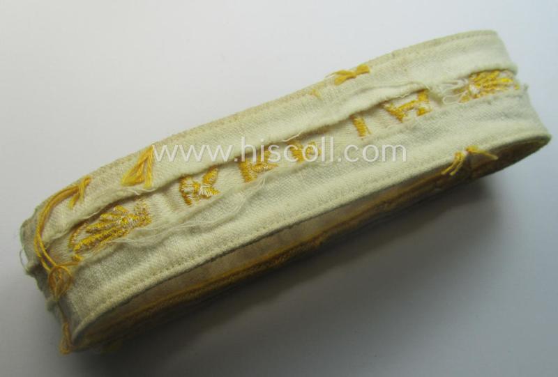 Truly worn WH cuff-title (ie. 'Ärmelstreifen') entitled: 'Kreta' (being an example that bears a printed 'RbN.'-numeral and that comes in an issued-, clearly worn- and/or most certainly once tunic-attached, condition)